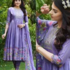 Purple cotton anarkali kurti with hand-embroidered neckline and colorful floral print dupatta, paired with matching leggings