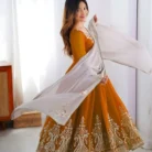 Heavy georgette anarkali suit maroon red with multi-thread embroidery and sequence work, paired with grey net dupatta for wedding and festive occasions