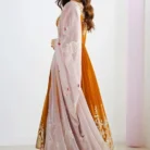 Close-up detail of anarkali suit embroidery showing multi-thread work and sequence detailing on georgette fabric